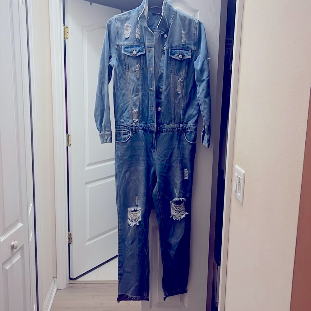 Fashion Nova Distressed Light Blue Denim Jumpsuit